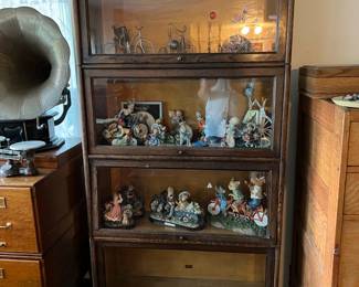 There are at least two barrister bookcases (possibly three) in this sale.  You can also see the figurines on display in this one.