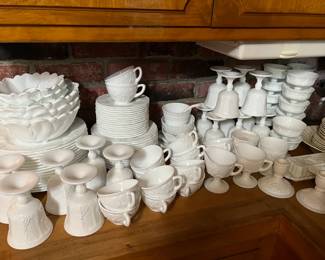 All white dishes, cups, saucers, candlestick holders, pouring  cups, and much more!