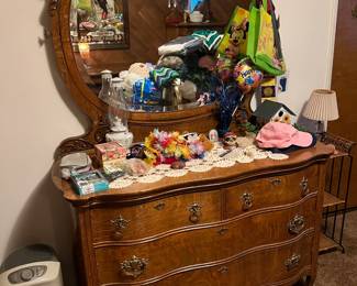 This integrated dresser and mirror definitely has a style and "a look" to it.