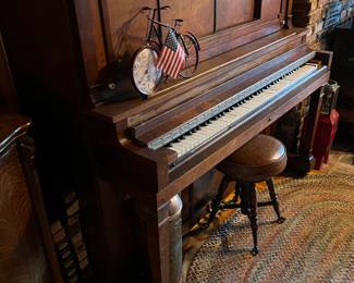 This, of course, is the upright player piano and stool that could be yours