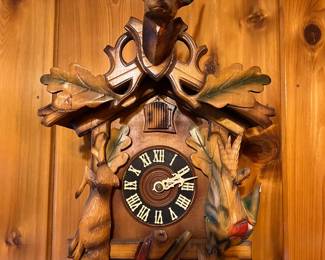Now here we have a cuckoo clock with a deer's head on the top.  