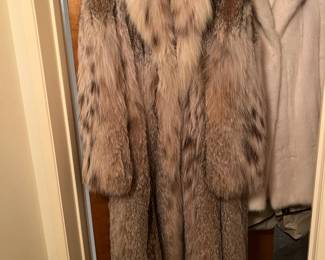 And this is the other fur coat.  As you can see this is much longer than the white coat.