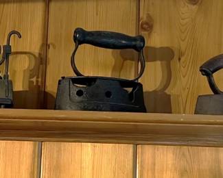 And to go along with the vintage collections, five vintage irons are on this shelf.