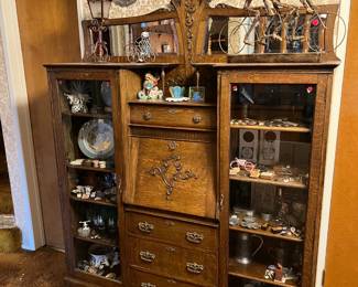 This is an exquisite piece, part secretary's desk, part display cabinets.  