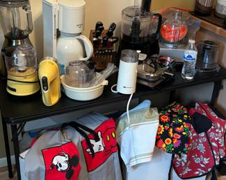Wusthof knives, blender, coffee maker and grinder, aprons