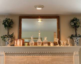 Mirror, decanters, plants