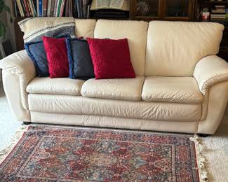 Leather couch, area rug