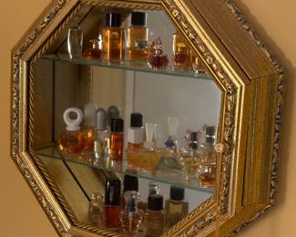 Perfume bottle collection, gold display wall hanging shelf