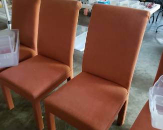 4 orange chairs