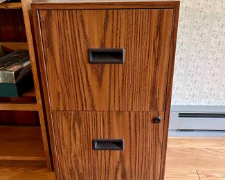 Metal 2 drawer file cabinet, meant to look like wood