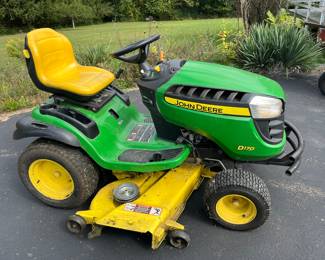 John Deere D170 ride on gas powered mower.  This mower is in working condition but needs a new belt.  It is being sold as is.  Following photos are close ups of the mower