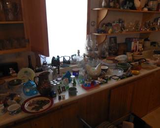 glassware, antiques, chicken items, sad irons,etc.