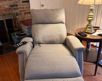 Penhurst triple power recliner. Heated seat, lumbar massage, remote control. Purchased one year ago. still under two year warranty.  $650.