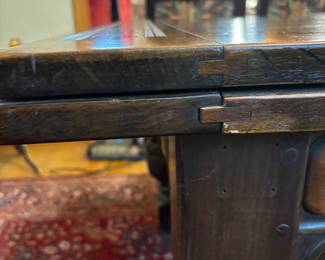 1920'S JACOBEAN REVIVAL DINING TABLE W/SELF STORING LEAVES