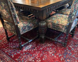 1920'S JACOBEAN REVIVAL DINING TABLE WITH SELF STORING LEAVES, 6 CHAIRS.  