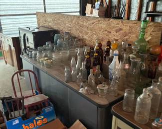 more bottles and blue canning jars