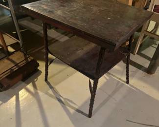 primitive table with twig legs