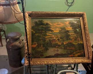 Antique lamp and gold guilded picture