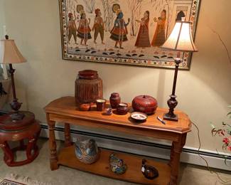 Nice sofa table loaded with interesting decor items