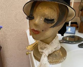 Cute vintage hat on Deco model.