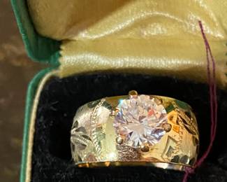 10K wide etched gold band with large CZ