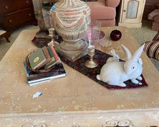 French Provincial coffee table with one of many bunnies