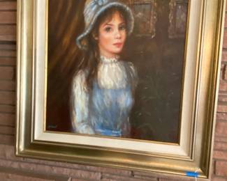 Portrait of a young woman done in oil.