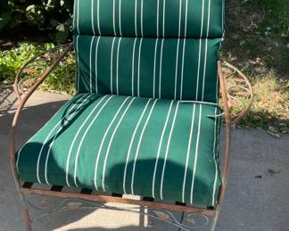 One of the many chairs belonging to the multiple sets of outdoor furniture