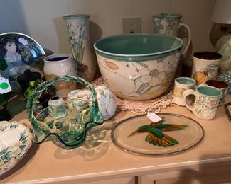 Artist pottery pieces in the kitchen area.