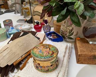 Capodimonte dresser jar, misc. vintage ladies items, and cute vintage hat on stand.