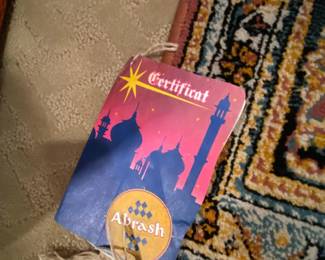 Paperwork on the Carastan rug