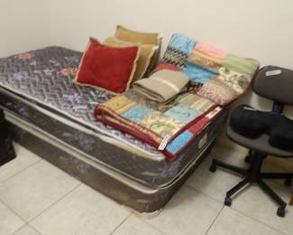 Twin bed, nice quilt, shams and pillows