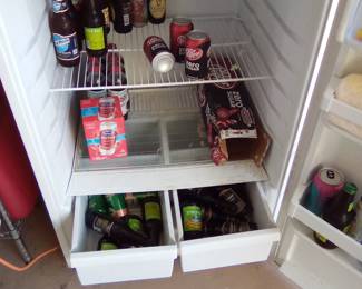 Selling the ICE COLD beer fridge with ALL CONTENTS. $30.00. Call me @ 386-405-1867 if you want it!