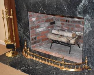 Brass fireplace tools and fender