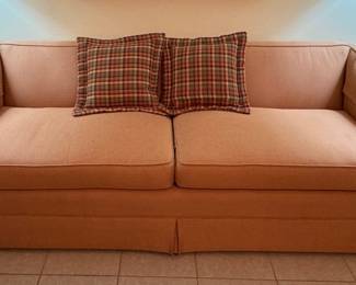 MCM track arm skirted sofa
