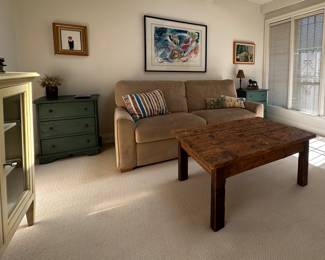 Cozy Den with Amish style cabinets, Rustic Table, and Sleeper Sofa