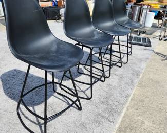 Fiberglass tulip chairs.
Set of 4 for $180
All extremely sturdy and stable. 
Metal base.