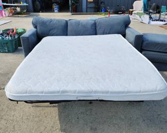 This is the sofa bed on the previous picture but showing the bed pulled out. 
$200