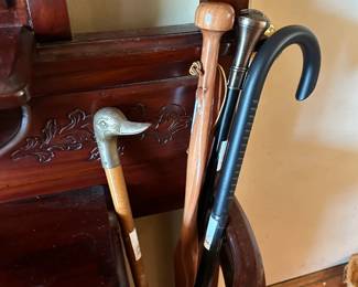 Brass duck head cane, the silver & black on has a Freemason symbol top and the black one is made of aluminum and for self-defense!