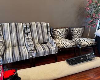 Fabric chairs, area rug, mounting tv bracket