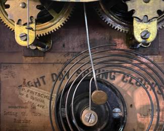 Backside of Antique Mantel Clocks ~ Warren Telechron & Seth Tomas Tudor Model