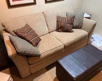 Tan Cloth Upholstered Love Seat with Throw Pillows 