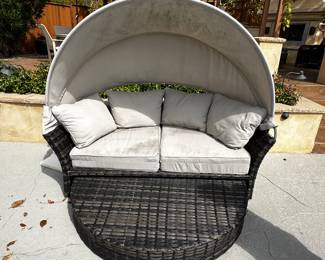 Lounge sofa that turns into sofa with collapsible shade