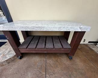 Outdoor serving area or bar on wheels