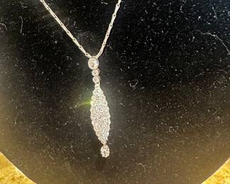 An Edwardian platinum and gold diamond pendant. An exquisite piece!