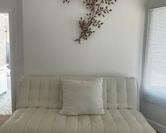 wall accessory and futon. Always great to have
