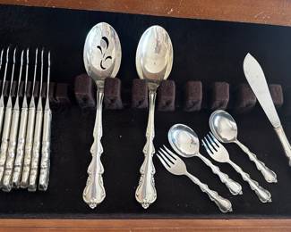 101 piece sterling international Angelique flatware