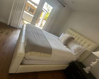 Cream tufted headboard and platform