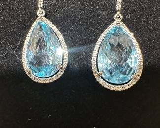 These are beautiful blue topaz and silmulted diamonds.
