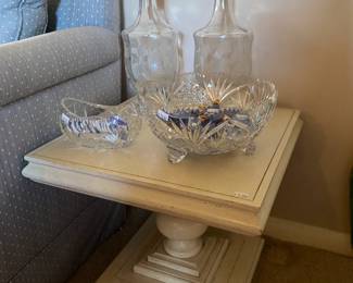 White pedestal style side tables